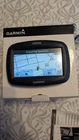 Garmin Zumo 390 Motorcycle Gps With Handlebar Mount Used. Price: $289.00.